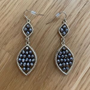 Gold and gun metal earrings.